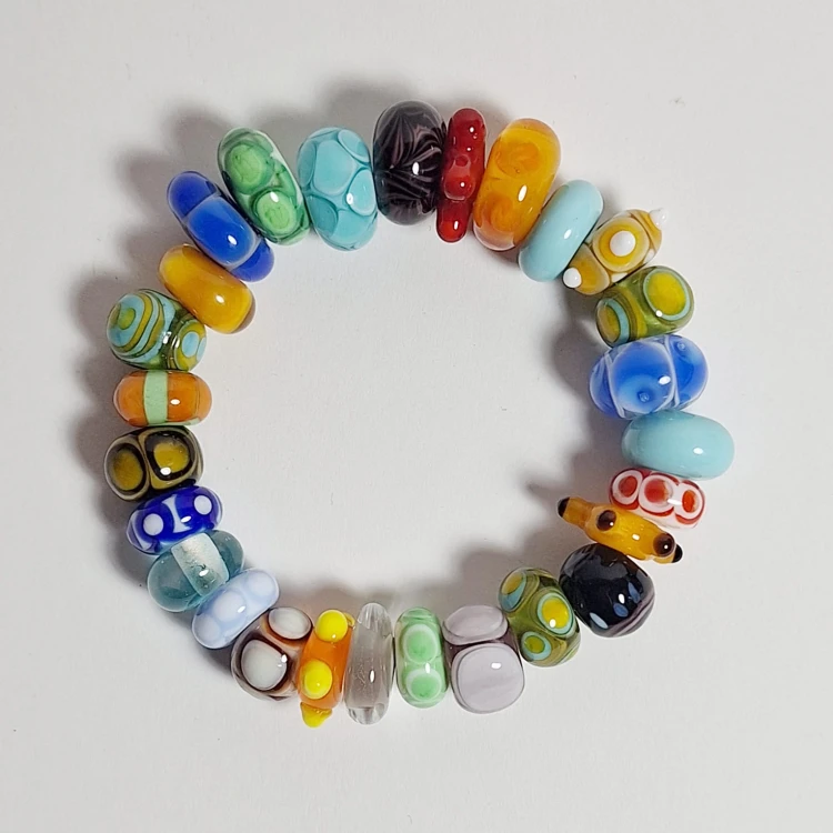 Bransoletka Tęczowy Światwielokolorowa ze szkła artystycznego  lampwork tęczowe kolory leżąca plasko