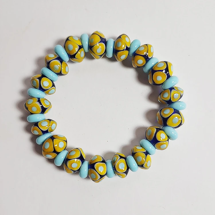 Cytrusowa Laguna kolorowa ręcznie wykonana bransoletka  ze szkła artystycznego  lampwork płasko na podłodze