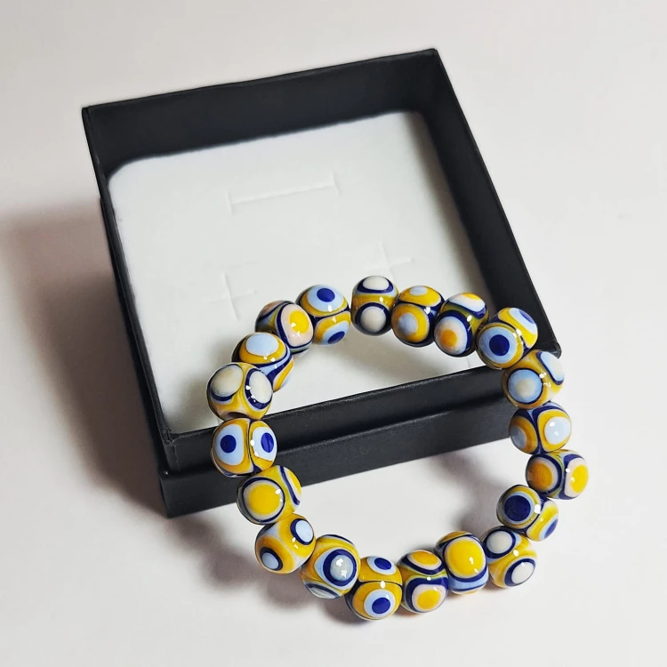Słoneczne Oko  ręcznie wykonana bransoletka  ze szkła artystycznego  lampwork