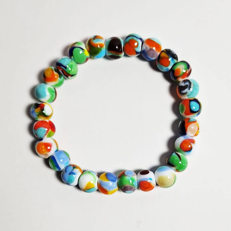 Ocean Kolorów  ręcznie wykonana bransoletka  ze szkła artystycznego  lampwork płasko na podłodze widok z góry