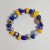 Letnie Niebo  ręcznie wykonana bransoletka  ze szkła artystycznego  lampwork płasko na stole