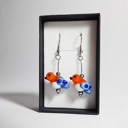 Pomarańczowe Ptaszki z niebieskim skrzydłem ręcznie wykonane dwa kolczyki ze szkła artystycznego  lampwork  w w pionie w pudełku